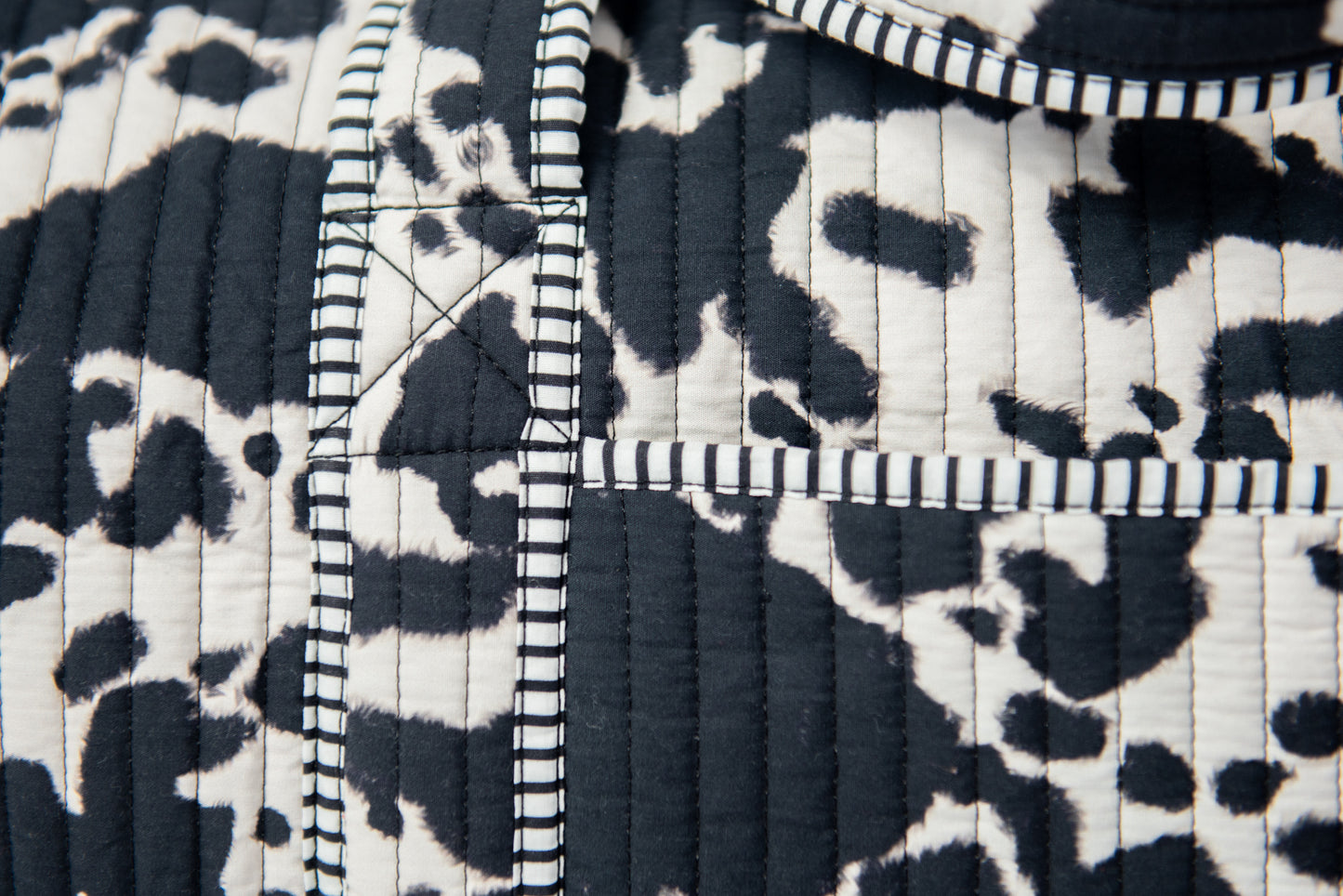 Cow Print Quilted Duffle Bag