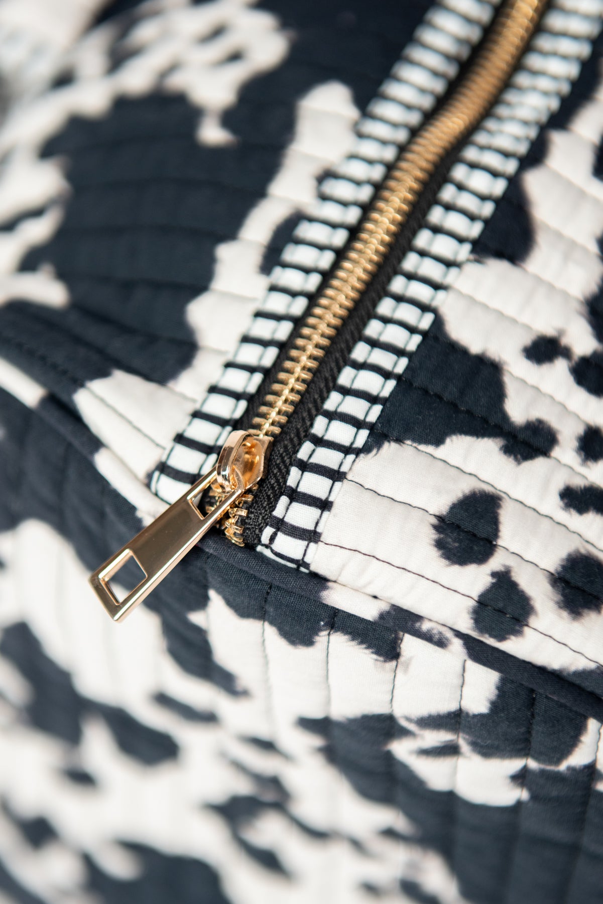 Cow Print Quilted Duffle Bag