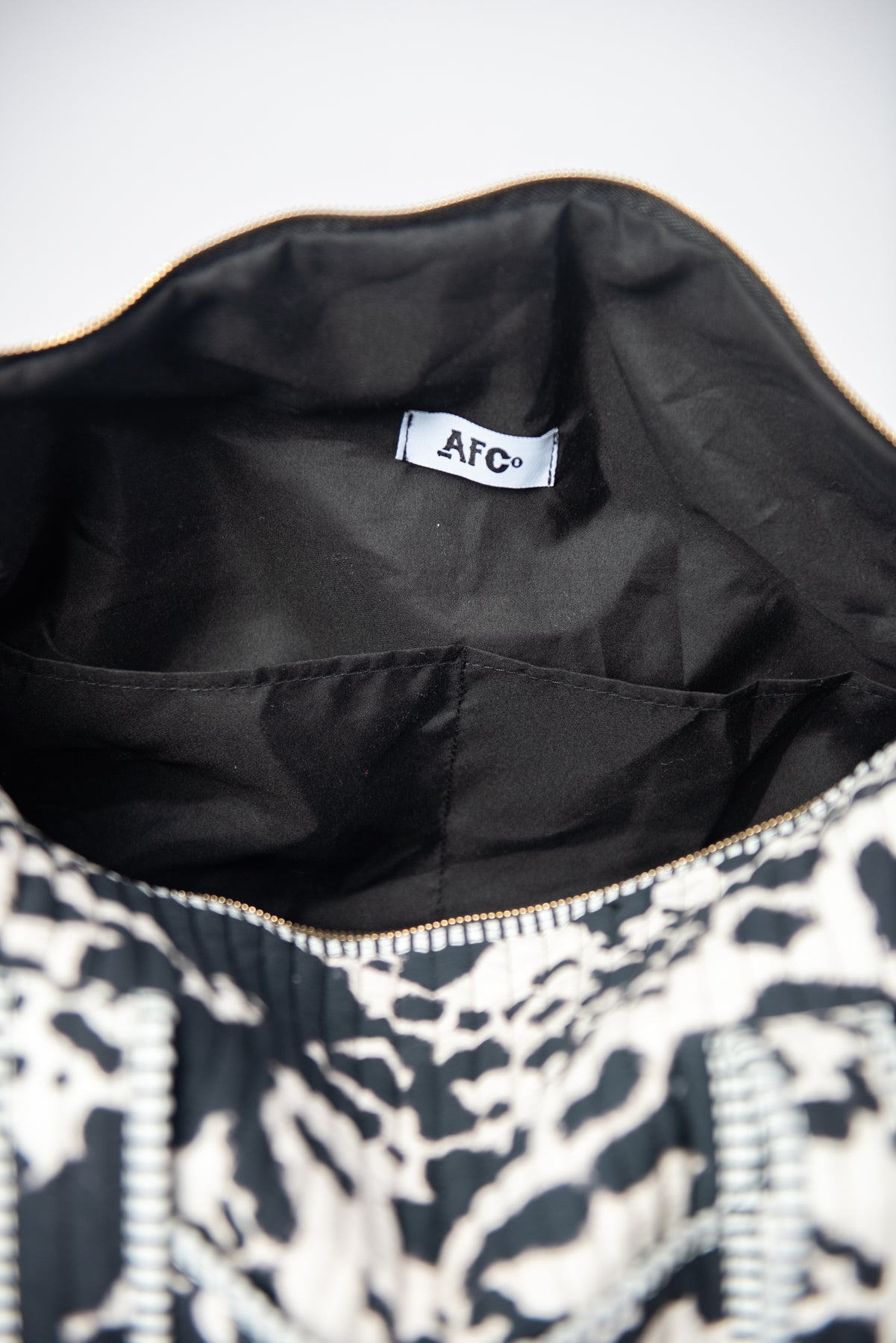 Cow Print Quilted Duffle Bag