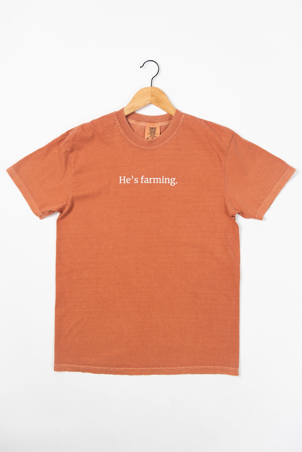 'He's Farming.' Rust Tee