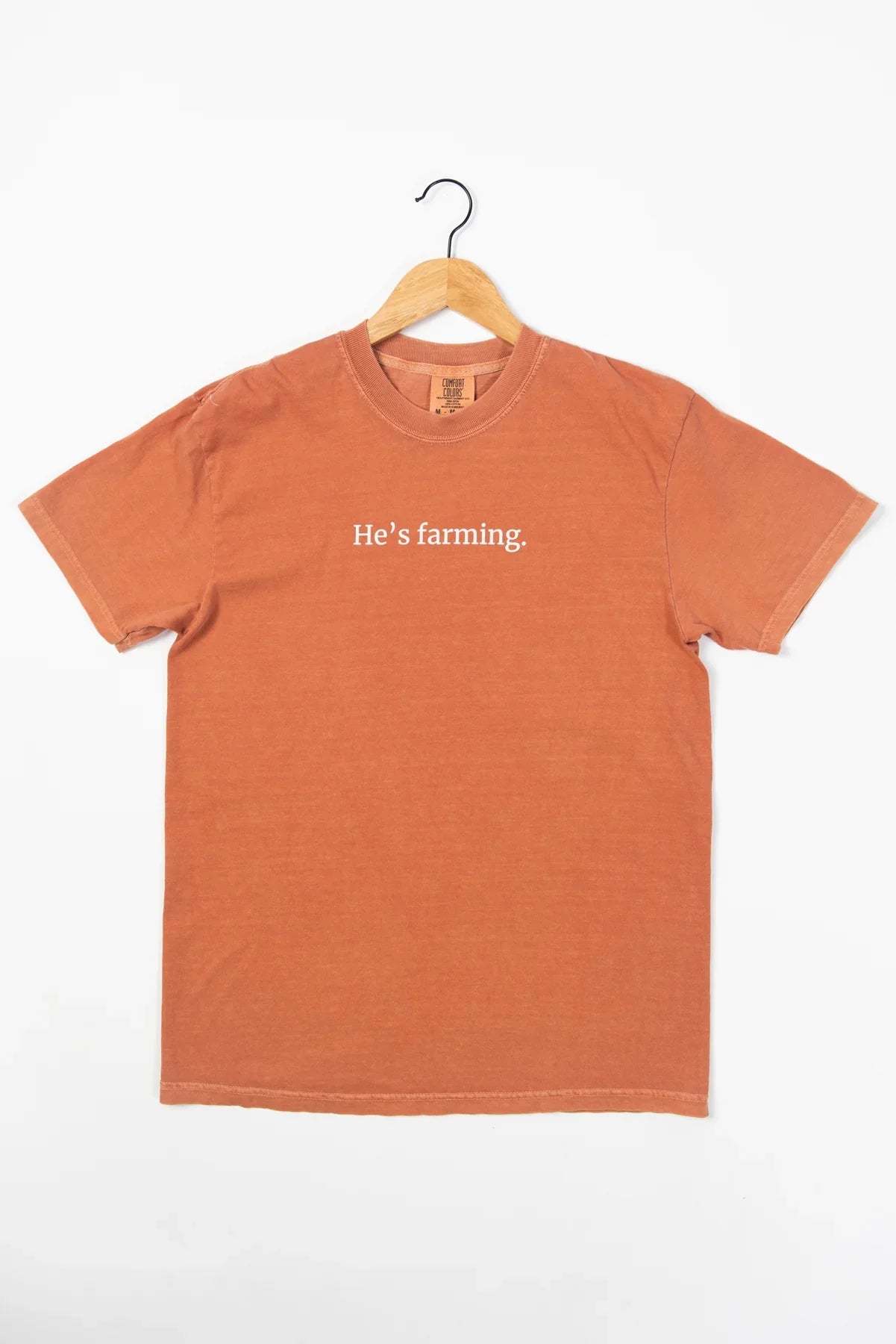 'He's Farming.' Rust Tee
