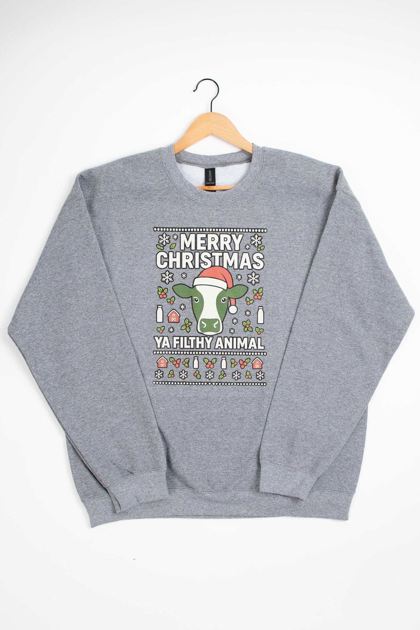 'Merry Christmas Ya Filthy Animal' Cow Crewneck