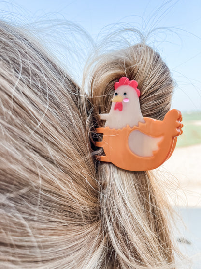 A shot featuring a Chicken Claw Clip securely fastening and enhancing a chic hairstyle.