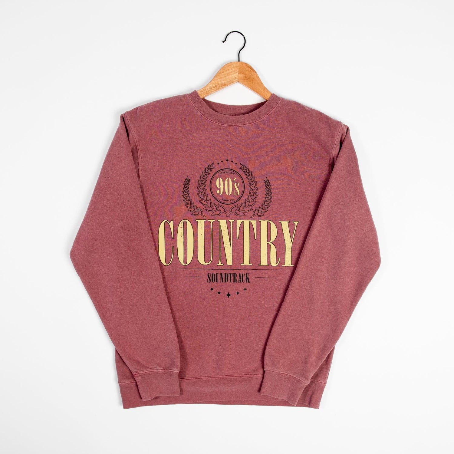 Rugged mauve crewneck sweatshirt with vintage '90s Country Soundtrack' graphic, relaxed fit, heritage rural lifestyle wear from American Farm Company.
