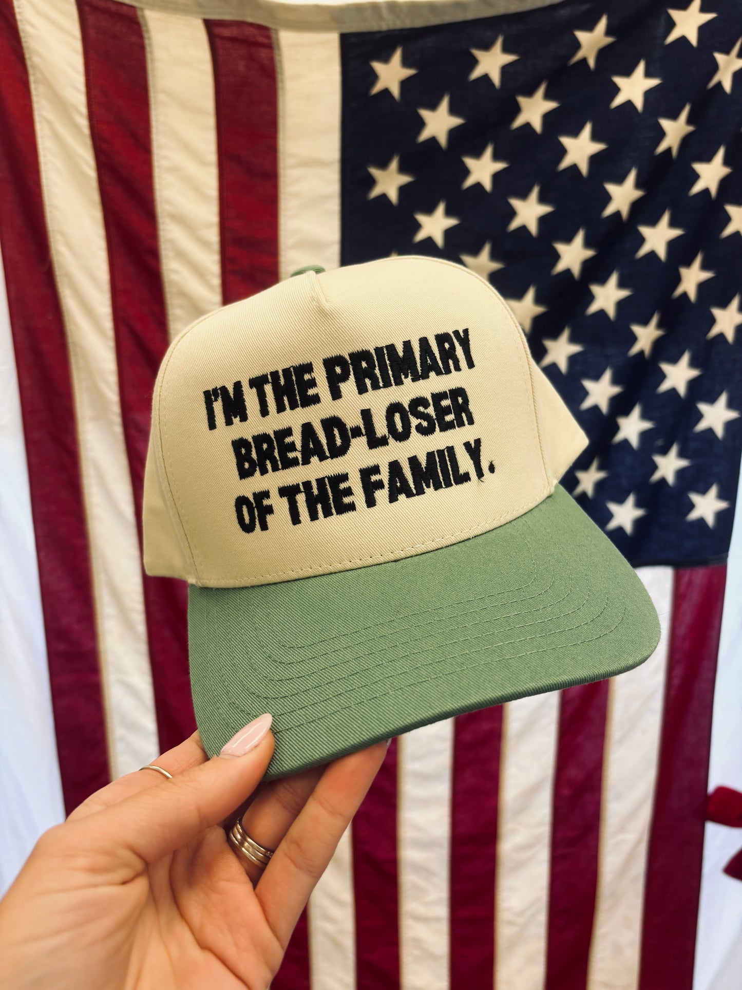 'I'm the Primary Bread-Loser of the Family.' Sage Embroidered Trucker Hat
