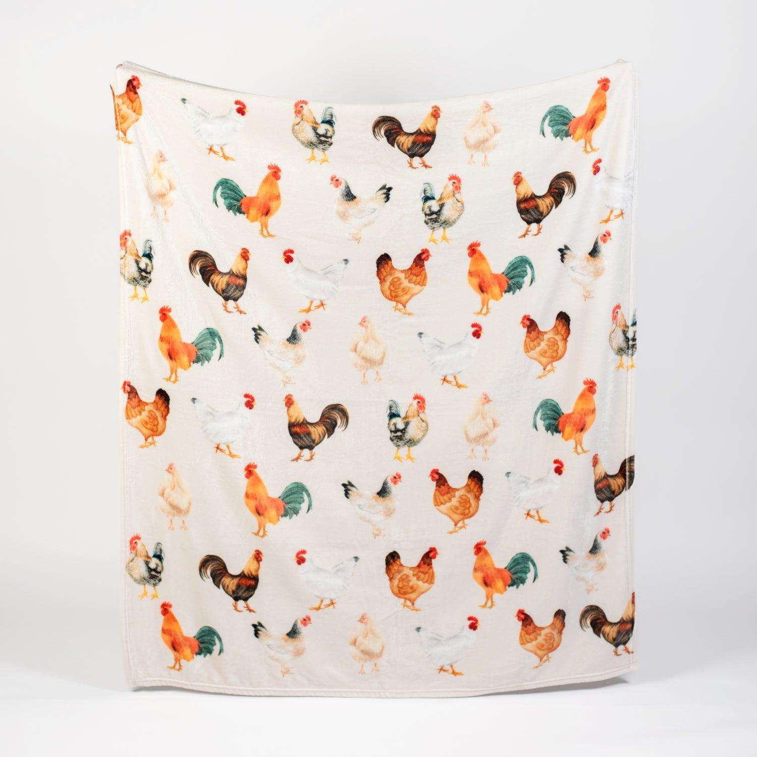 Cream plush blanket featuring realistic heritage chicken illustrations, farmhouse-inspired, American Farm Company rural lifestyle decor