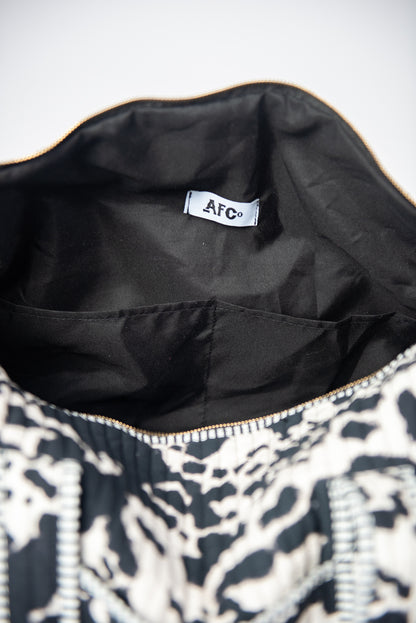 Cow Print Quilted Duffle Bag