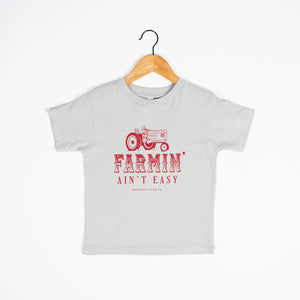 ‘Farmin’ Ain’t Easy’ Red Toddler/Youth Tees - American Farm Company