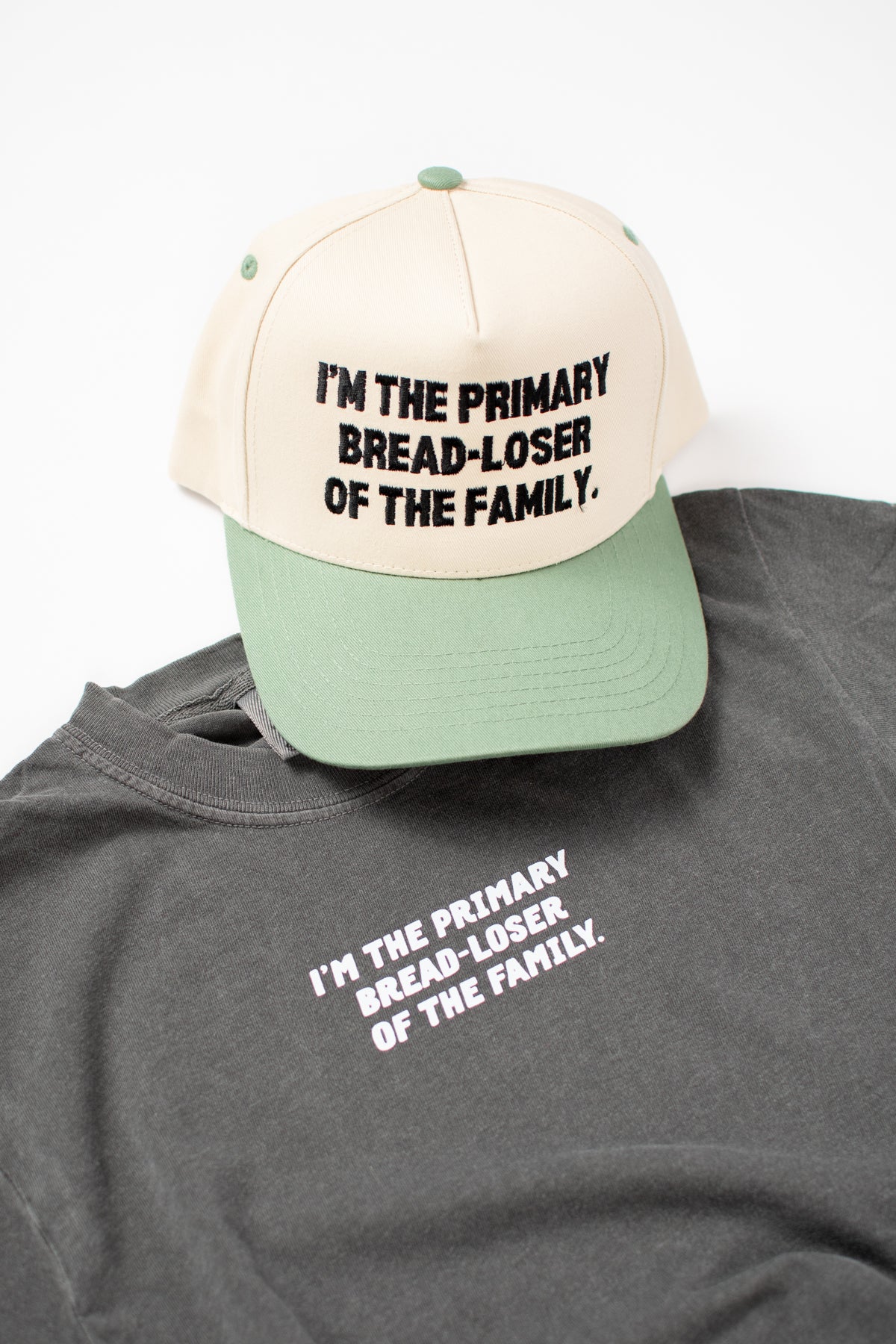 'I'm the Primary Bread-Loser of the Family.' Sage Embroidered Trucker Hat