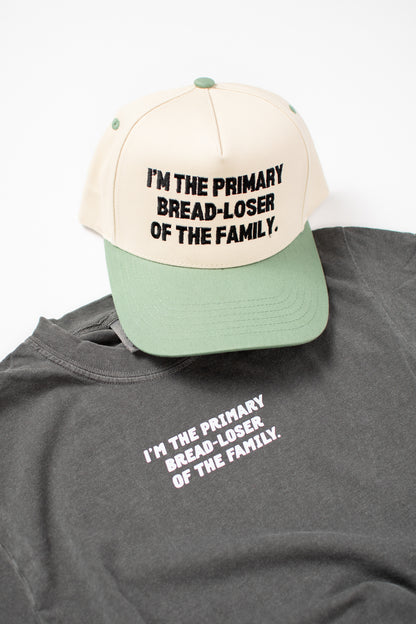 'I'm the Primary Bread-Loser of the Family.' Sage Embroidered Trucker Hat