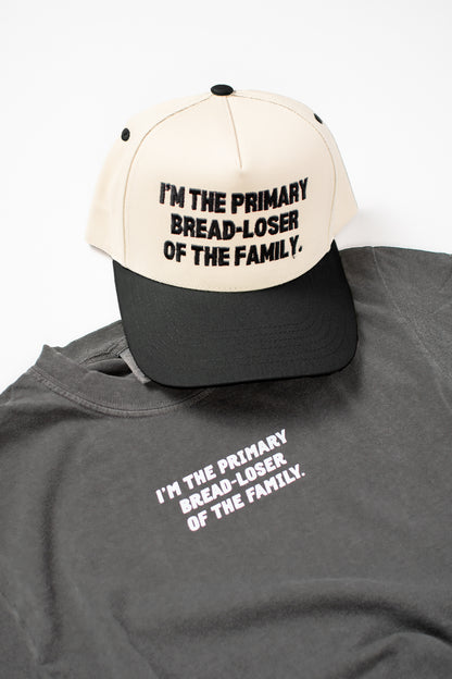 I'm the Primary Bread-Loser of the Family.' Embroidered Trucker Hat