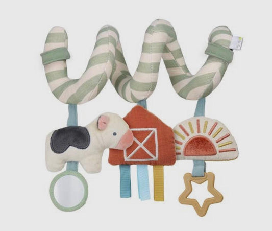 Heritage-inspired soft green and cream striped activity spiral with plush barn, cow, sunrise, and textured baby teether, celebrating rural legacy at American Farm Company.