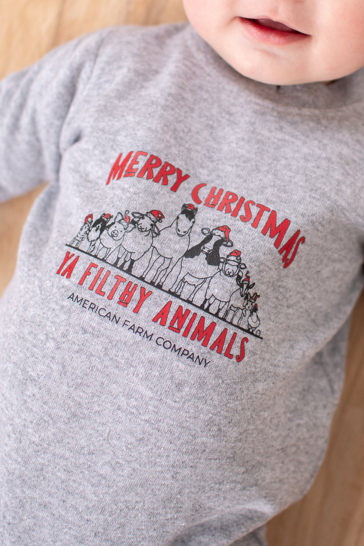 'Merry Christmas Ya Filthy Animal' Baby One Piece