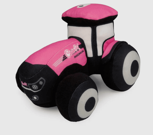 Heritage-inspired soft plush Case IH Magnum tractor toy in vibrant pink and black, capturing rural legacy for American Farm Company’s agricultural family lifestyle collection.