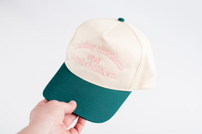 'Raising Chickens and Feral Children.' Embroidered Green Trucker Hat