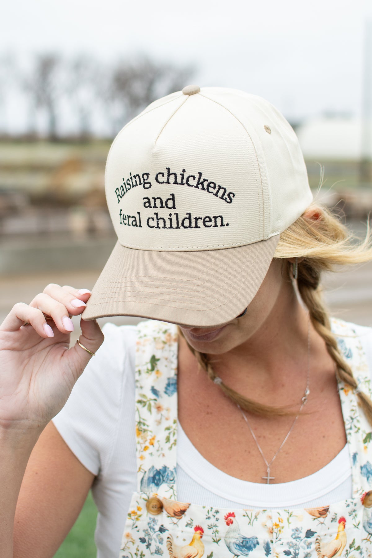 Raising Chickens and Feral Children.' Embroidered Trucker Hat