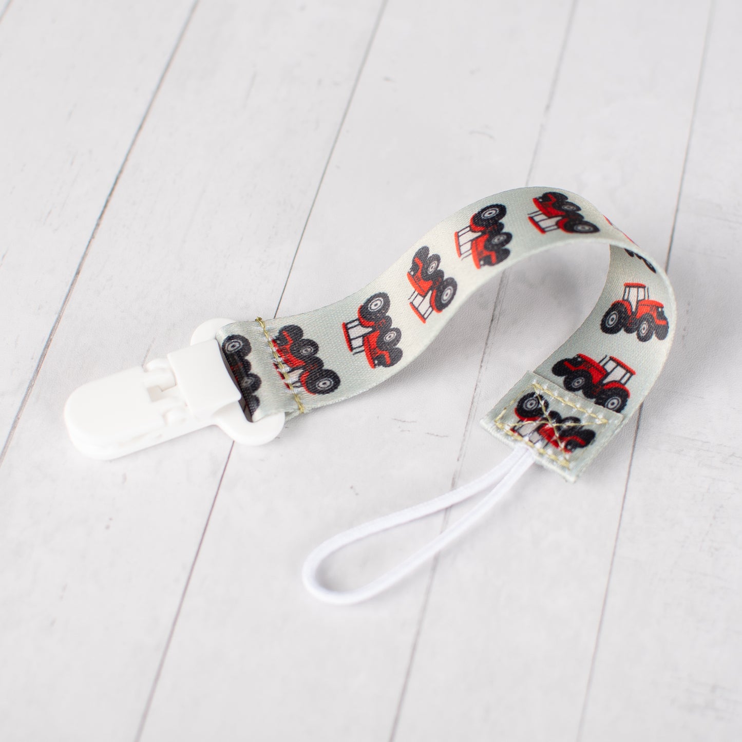 Red Tractor Paci Clip