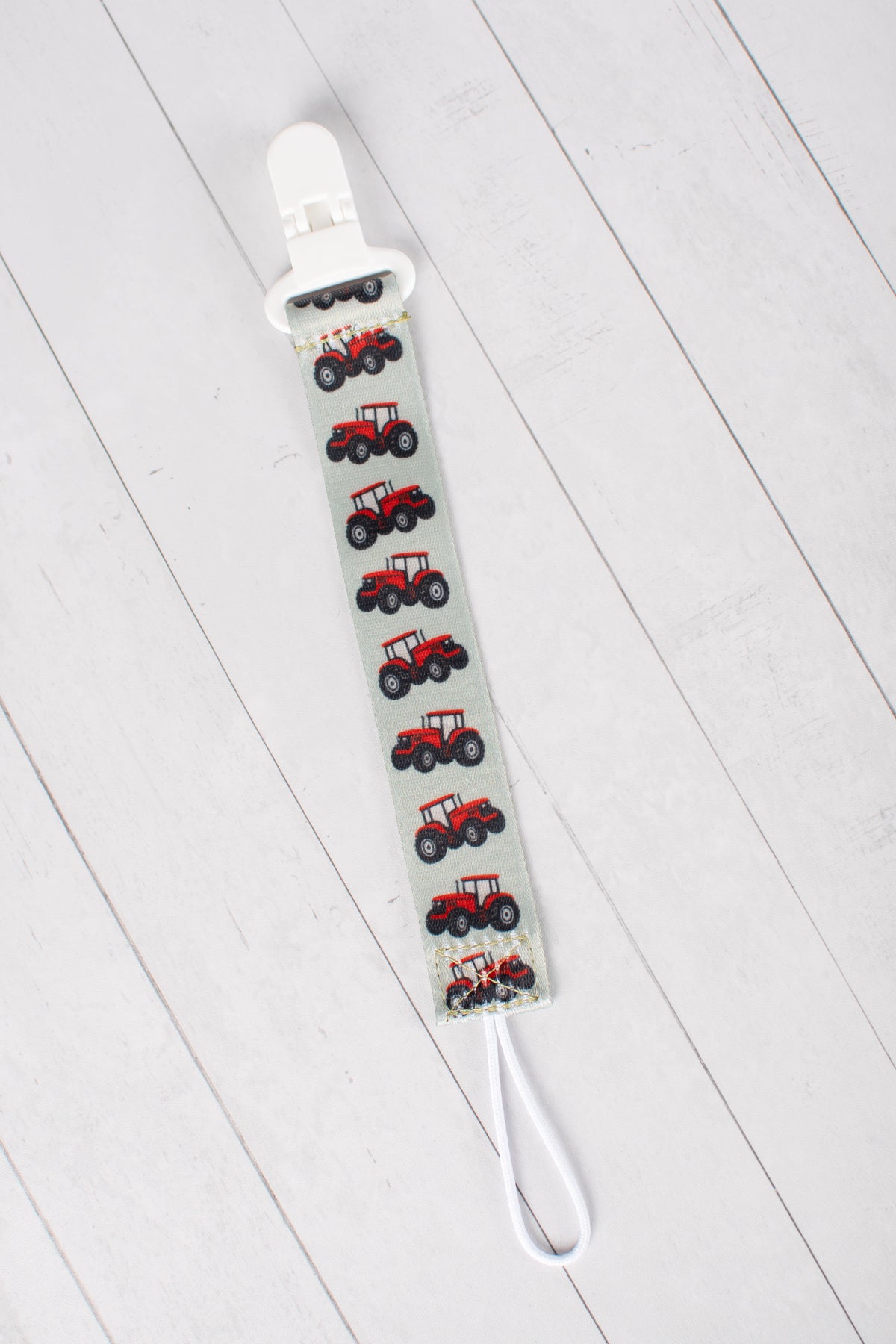 Red Tractor Paci Clip