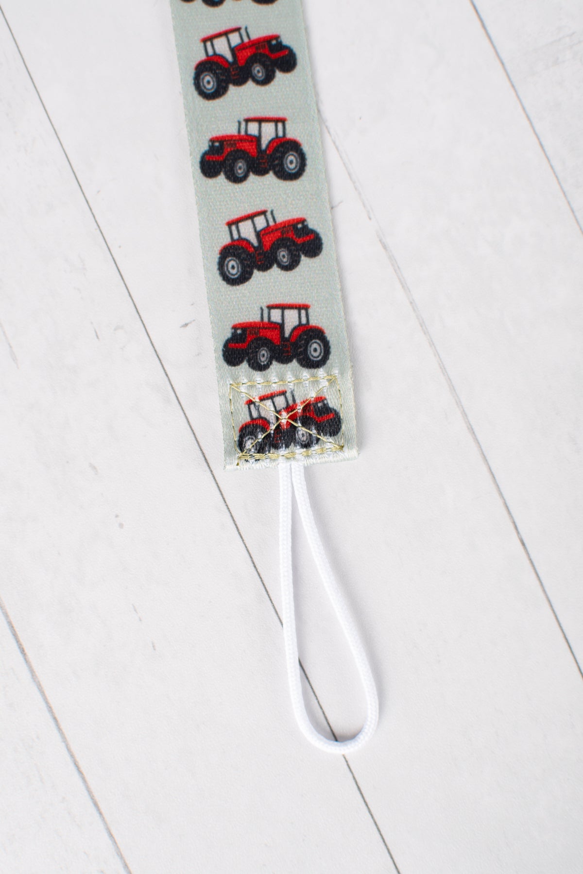 Red Tractor Paci Clip