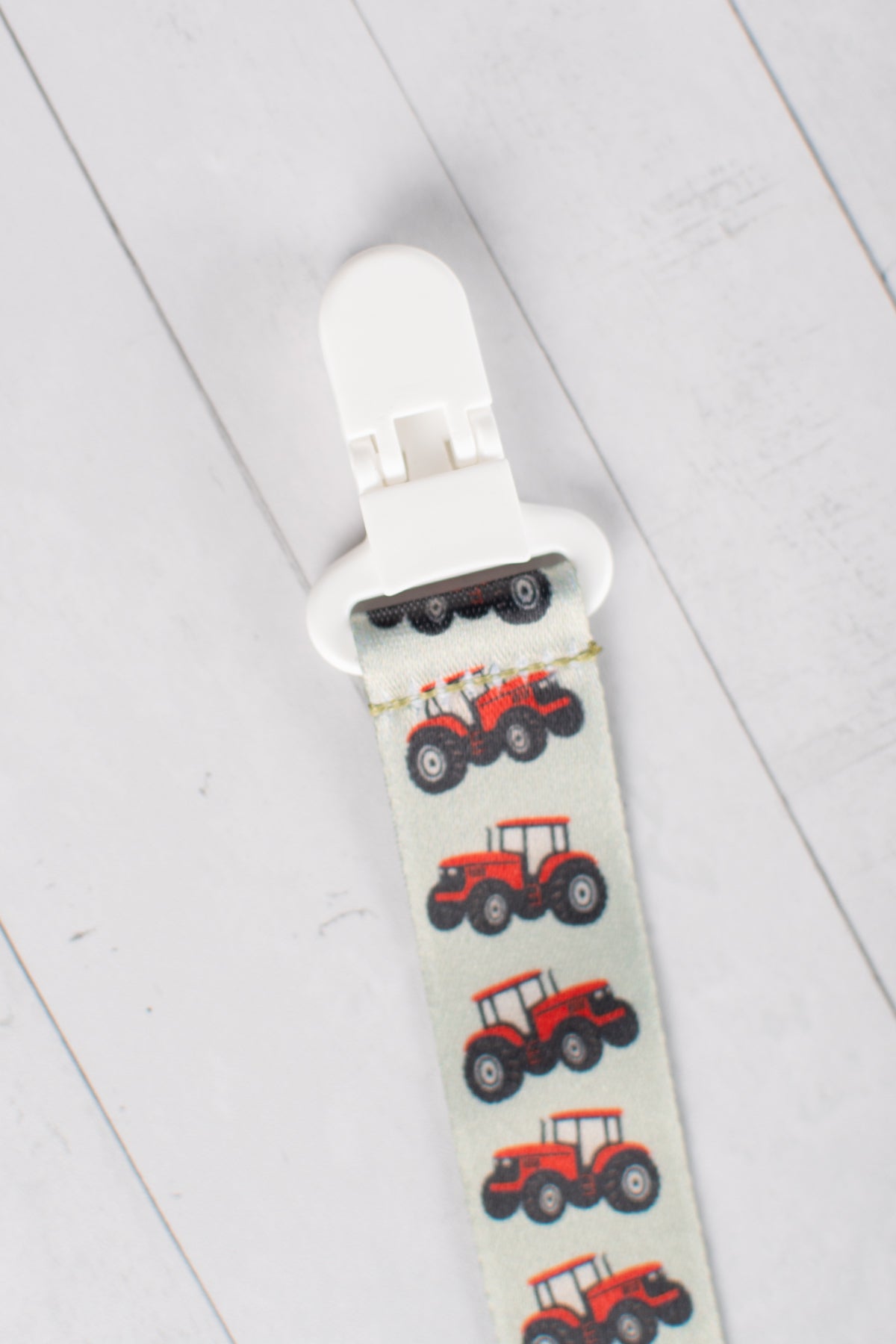 Red Tractor Paci Clip