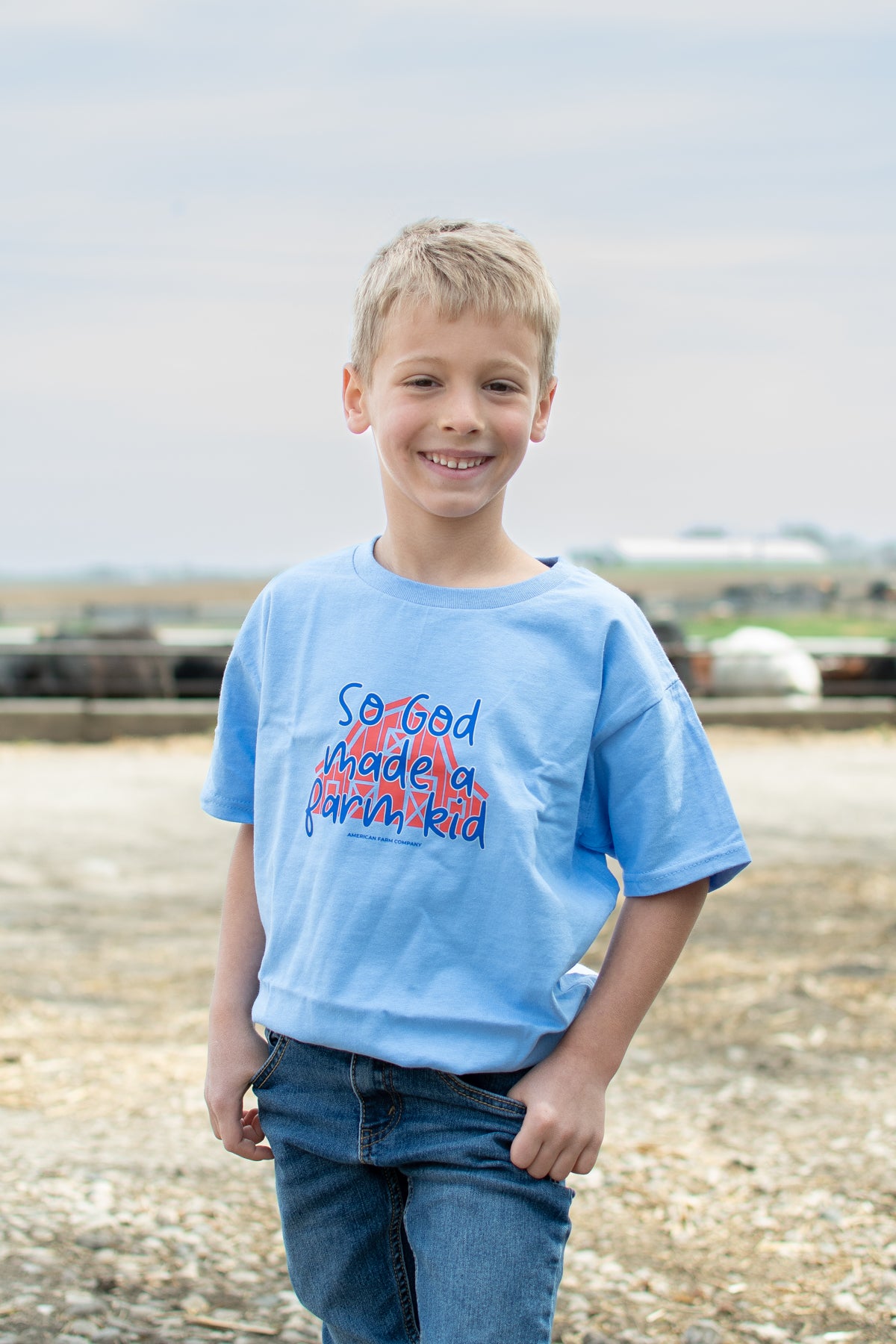 'So God Made a Farm Kid' Barn Toddler/Youth Blue Tee