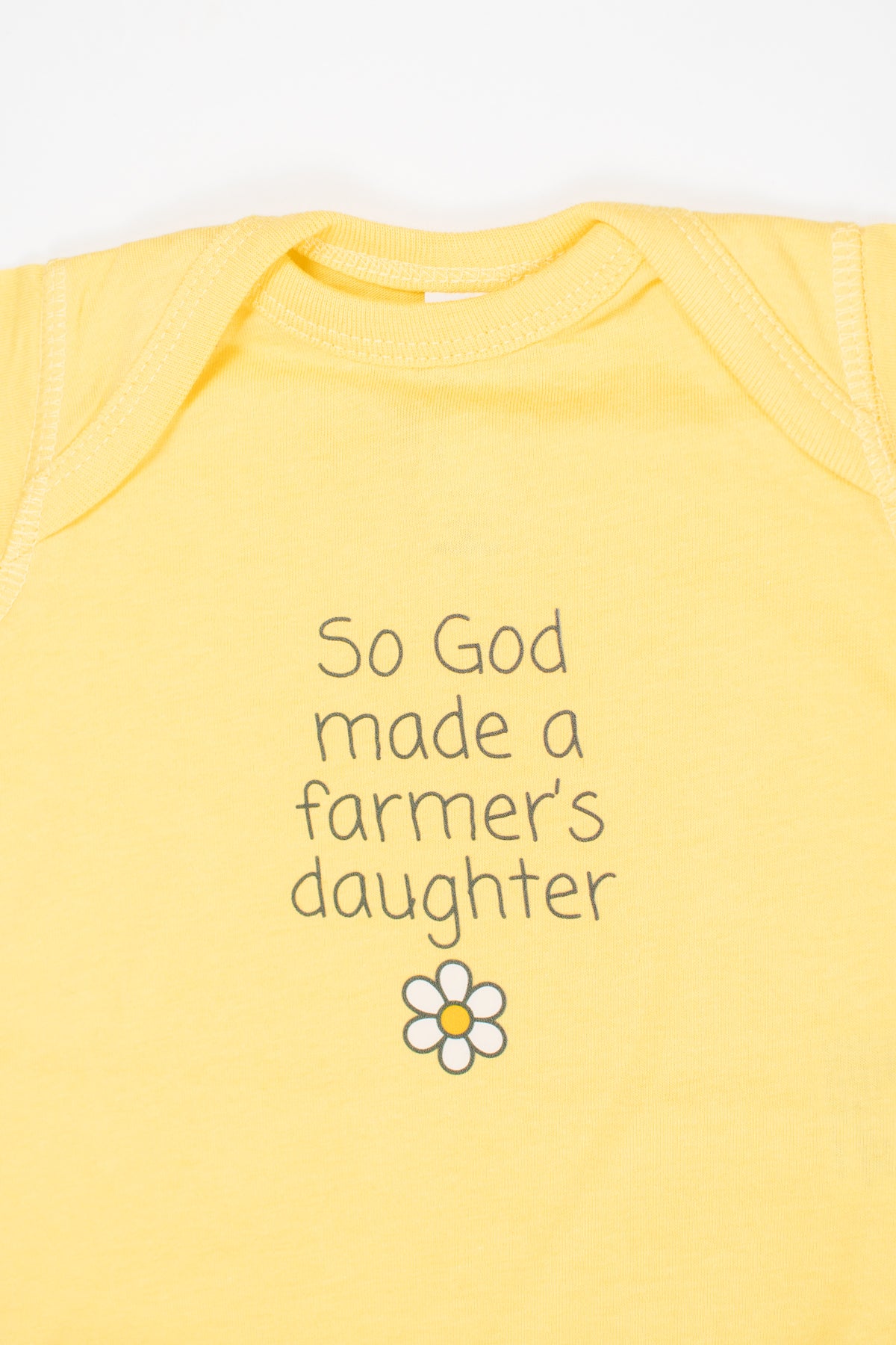 So God Made a Farmer's Daughter' Yellow Onesie