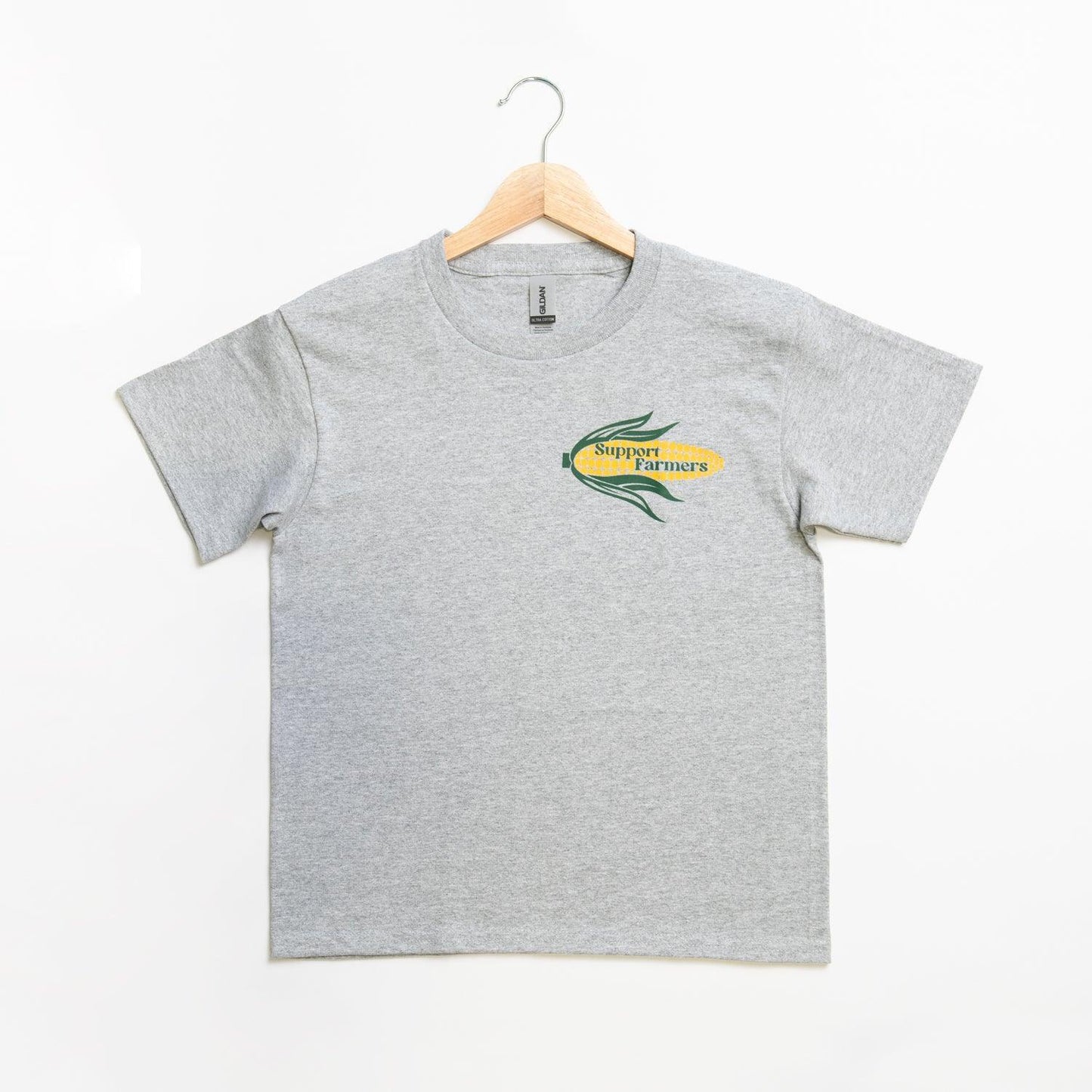 Heather gray youth tee in soft cotton, relaxed fit, with a yellow corn graphic reading 'Support Farmers'—ideal rural heritage apparel by American Farm Company.