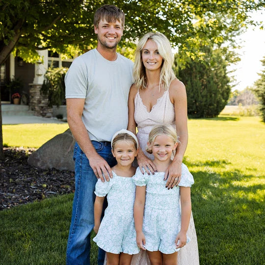 Family standing outdoors