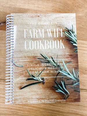 Complete Farm Wife Cookbook by Rachel Granstra on wood table