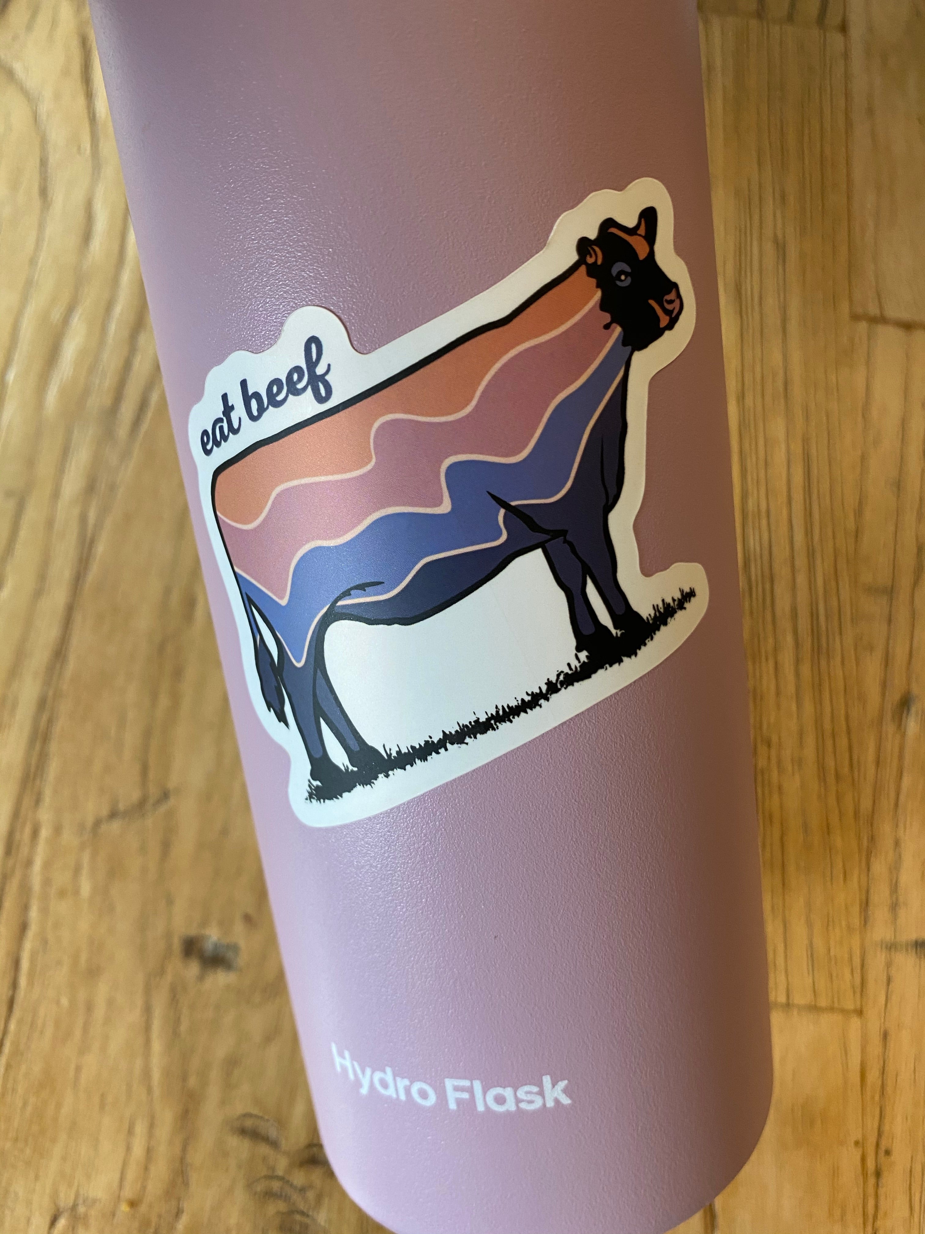 Retro Eat Beef Stickers on a hydro flask tumbler
